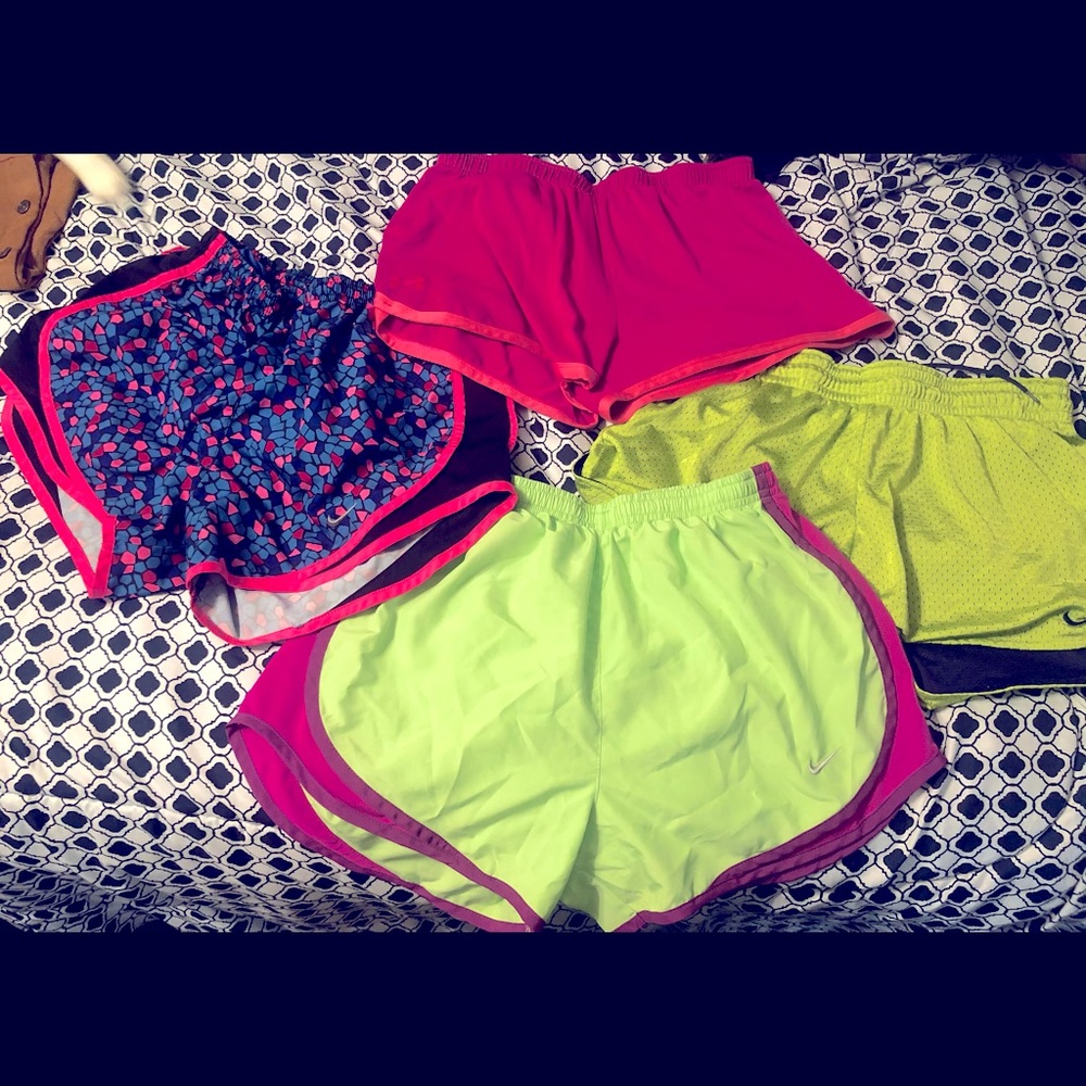 3 Nike shorts 1 pair of UA shorts